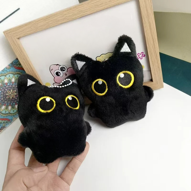 Lindo peluche de un gato negro - Photography Rules reseña y precio