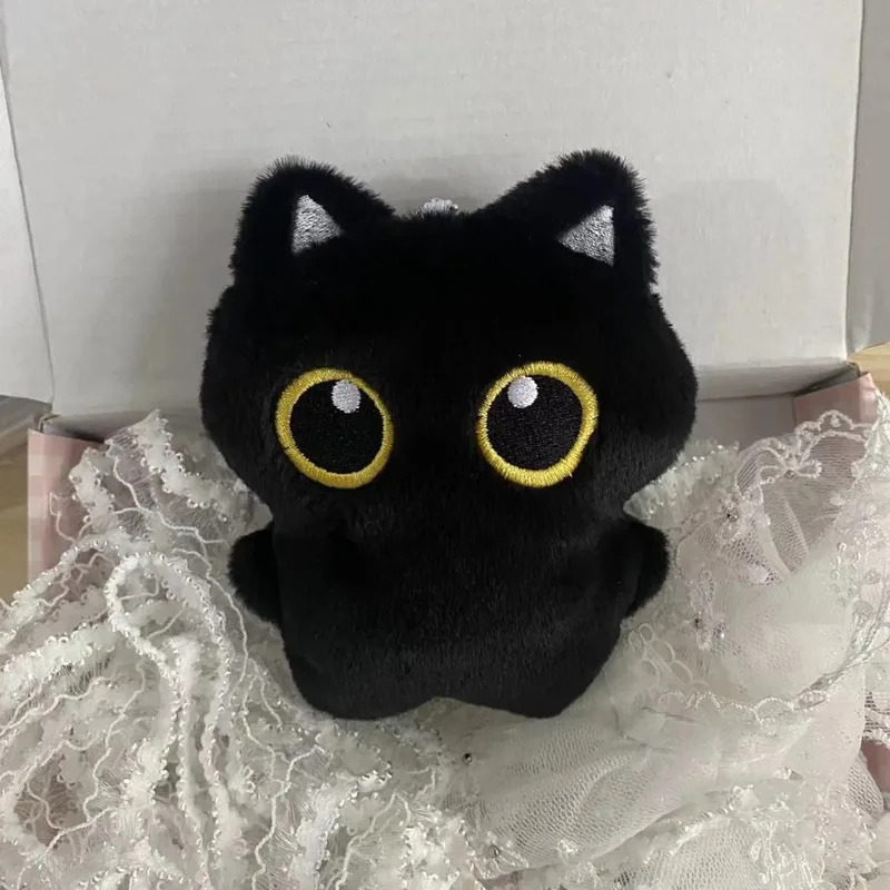Lindo peluche de un gato negro - Photography Rules reseña y precio
